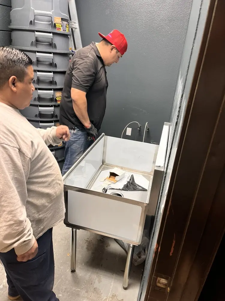 Commercial plumbing and sink installation in Crete